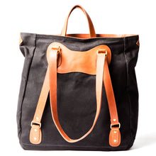 Load image into Gallery viewer, RucTote in black canvas with tan leather trim