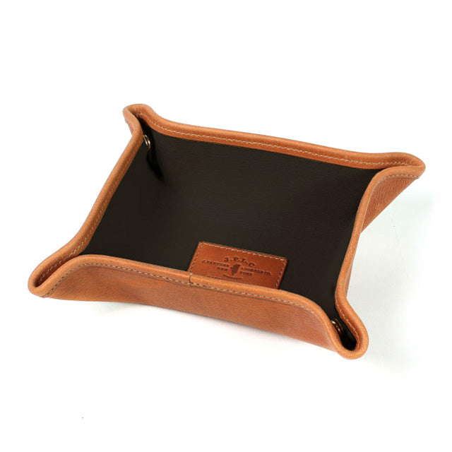 Travel-stuff Tray in tan grain leather with black canvas inner