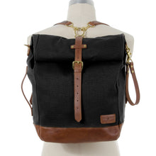 Load image into Gallery viewer, RollTote in black canvas with tan leather trim

