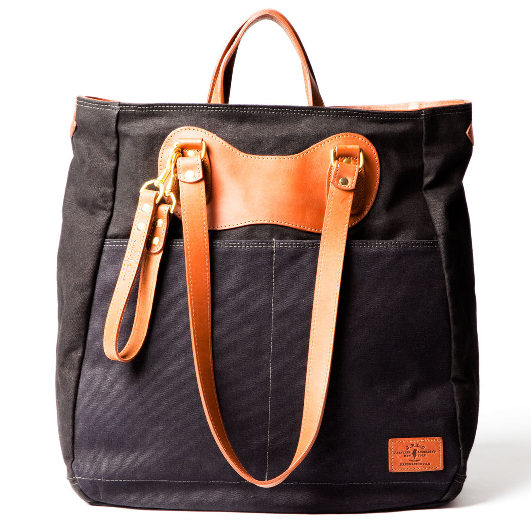 RucTote in black canvas with tan leather trim
