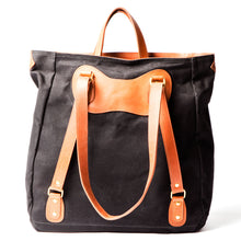 Load image into Gallery viewer, RucTote in black canvas with tan leather trim
